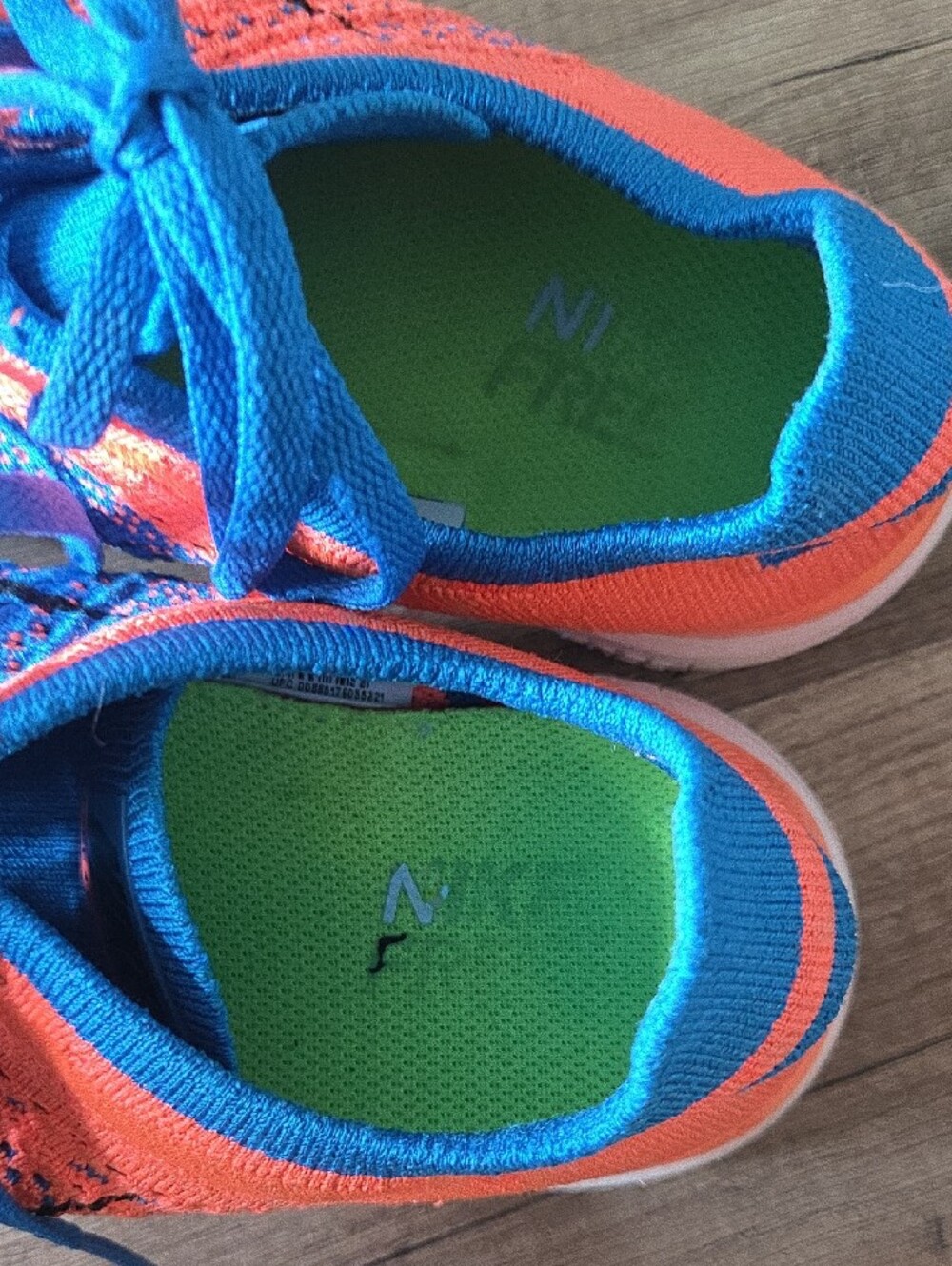 Nike Free 4.0 Flyknit Sneakers in Bright Blue & Coral - Picture 4 of 9